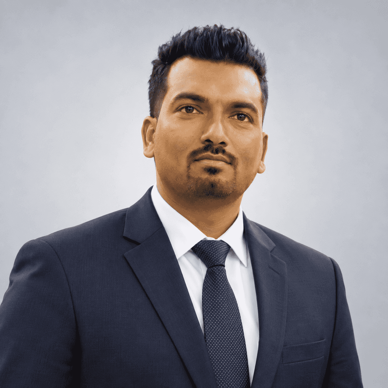 Sidharth Gaikwad, owner of SSD Pest Control Services Pvt. Ltd., in a navy suit and tie